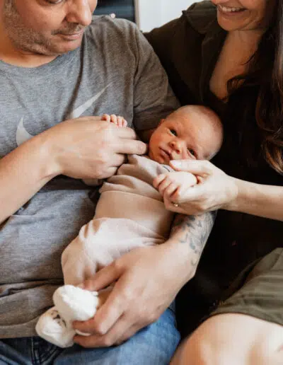 Baby mit Eltern Fotograf Foto